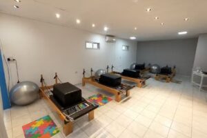 Postura Pilates Reformer